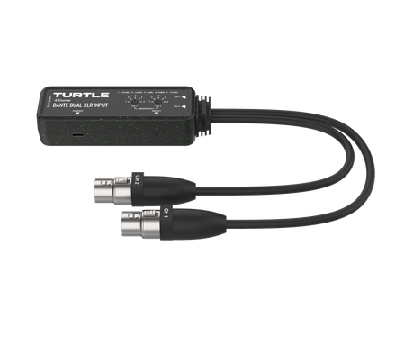 Turtle audio adapter with dual XLR cables on a white background
